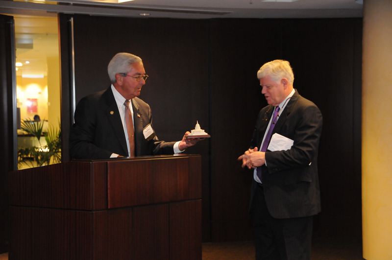 The Hon. Ron Sarasin, left, thanks Congressman Larson with a gift from the Society.
