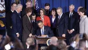 President Obama signs the repeal of “Don’t Ask, Don’t Tell” with Members of Congress in 2010. Chuck Kennedy, Official White House Photo.