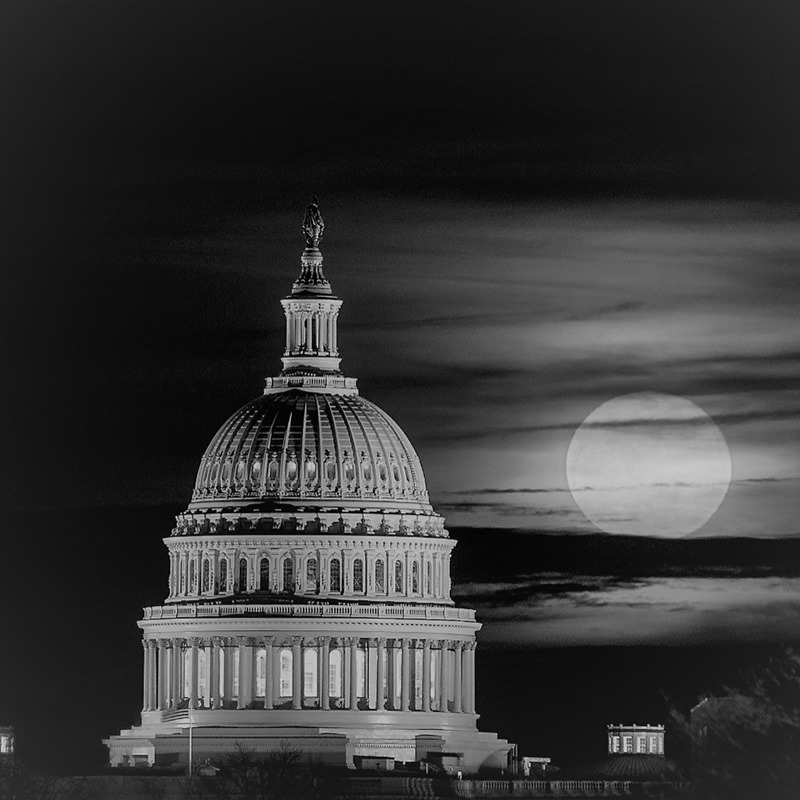 The Haunted History of the U.S. Capitol: Edited photograph of the U.S. Capitol at night (Original photograph by Zack Lewkowicz)